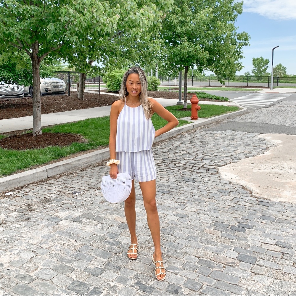 Blue and white striped romper with open back